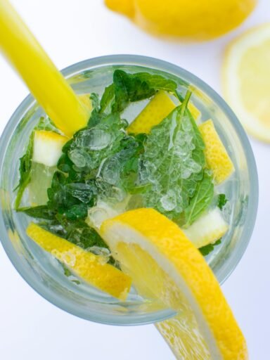 Flat Lay Photograph of Highball Glass With Sliced Lemon